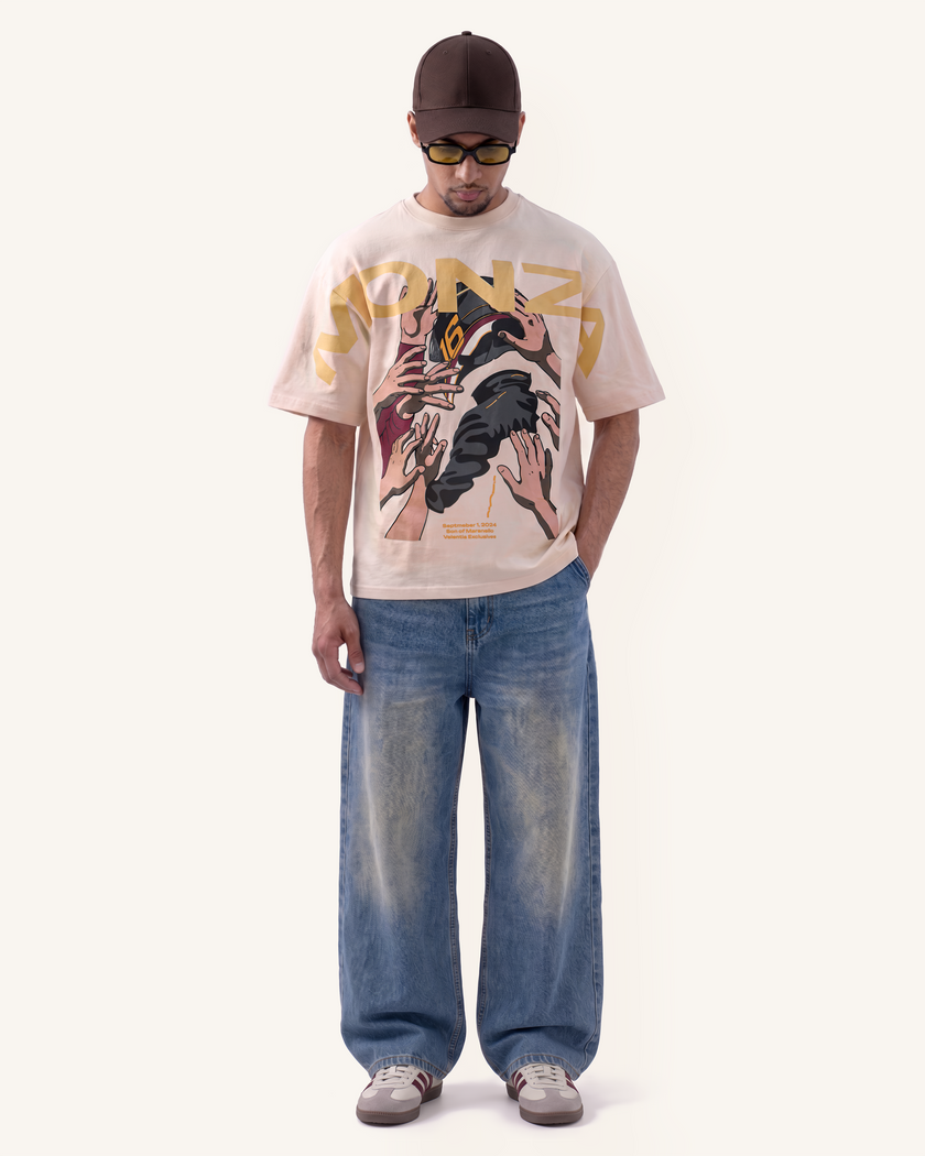 Model wearing Velentia cream Monza September graphic T-shirt with relaxed oversized fit