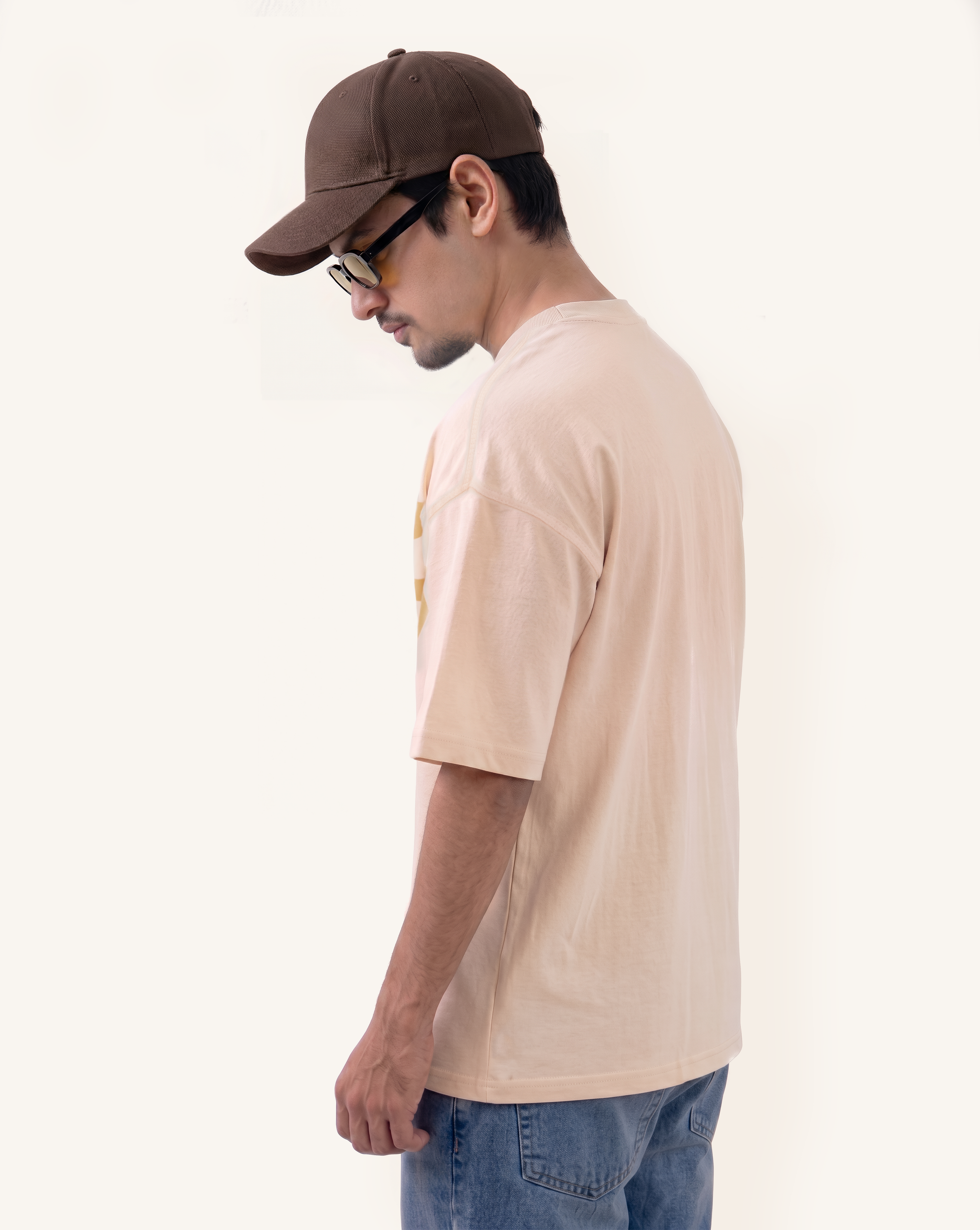 Velentia cream September motorsport graphic T-shirt side view, oversized fit on model.