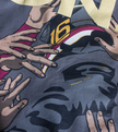 Close-up of Velentia grey Monza September T-shirt showing detailed motorsport inspired graphic print