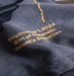 Close-up of Velentia grey Monza September T-shirt showing detailed motorsport inspired graphic print